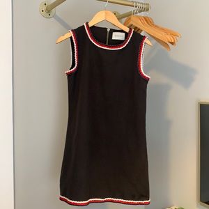 Black Gucci dress with red, white, and navy trim